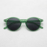 Frame: Transparent Green Lens: Dark Green