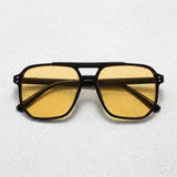Black frame — Yellow lens