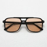 Black frame — Brown lens